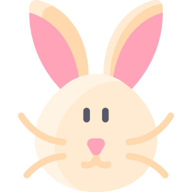 a white bunny with pink ears