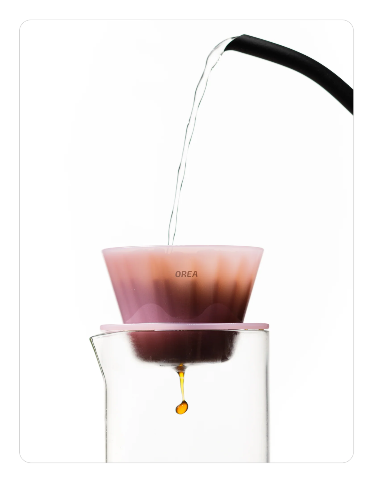 a liquid being poured into a beakle