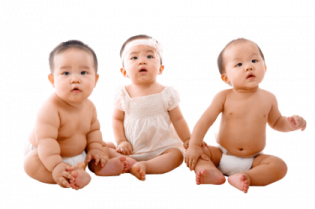 three babies sitting side by side on a white background