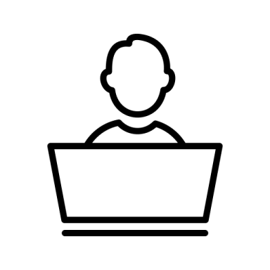 a person sitting in front of a laptop