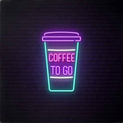 coffee to go neon sign on a brick wall
