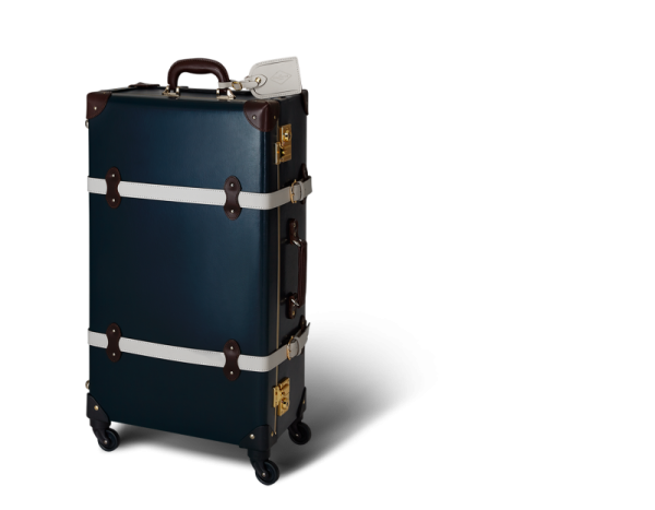 a black and white suitcase on wheels