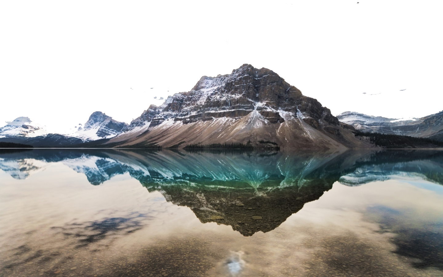 reflection of mountains in water
