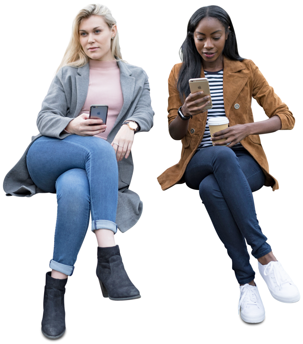 two women sitting next to each other woman