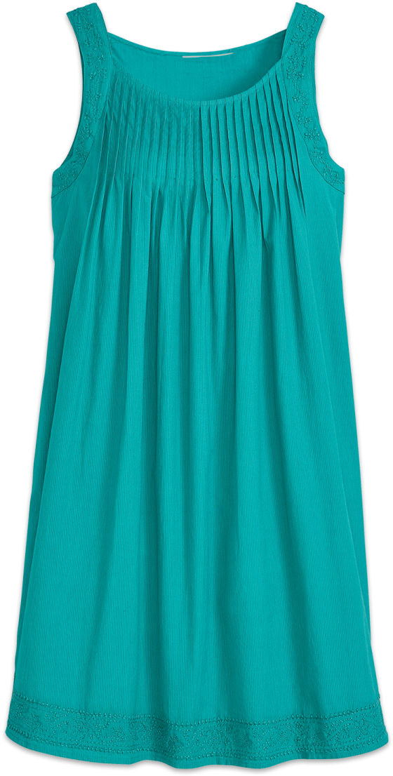 a girl wearing a green dress