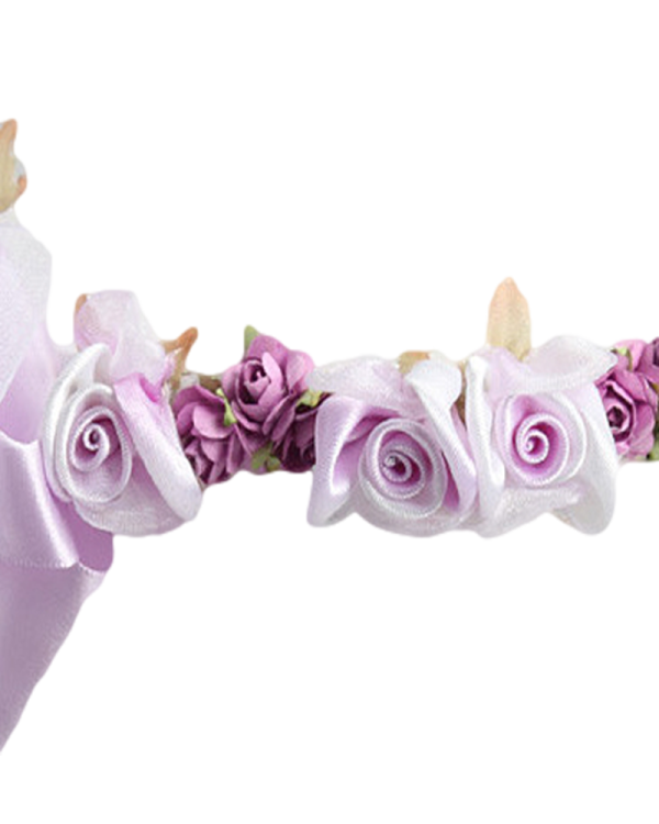 a flower crown with pink roses on it