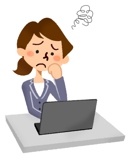 a woman sitting at her desk with a laptop