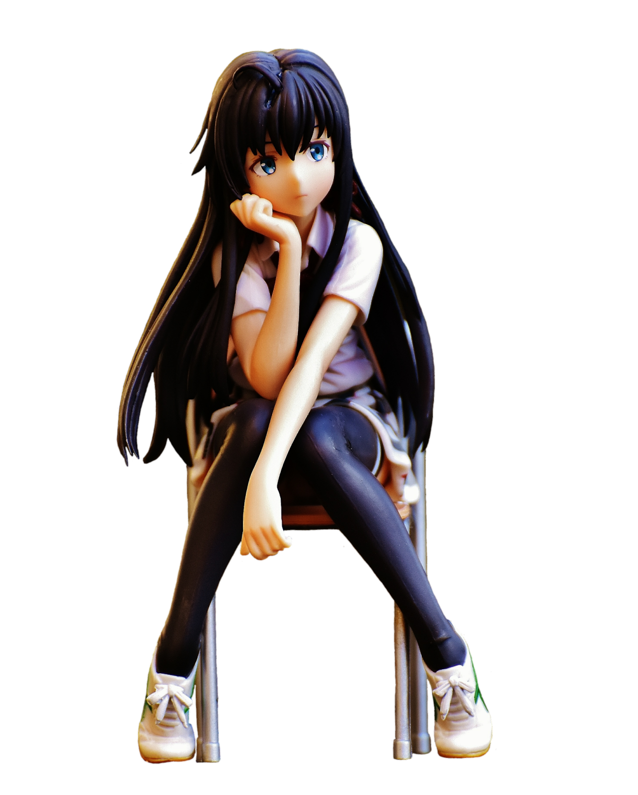 a girl sitting on top of a chair