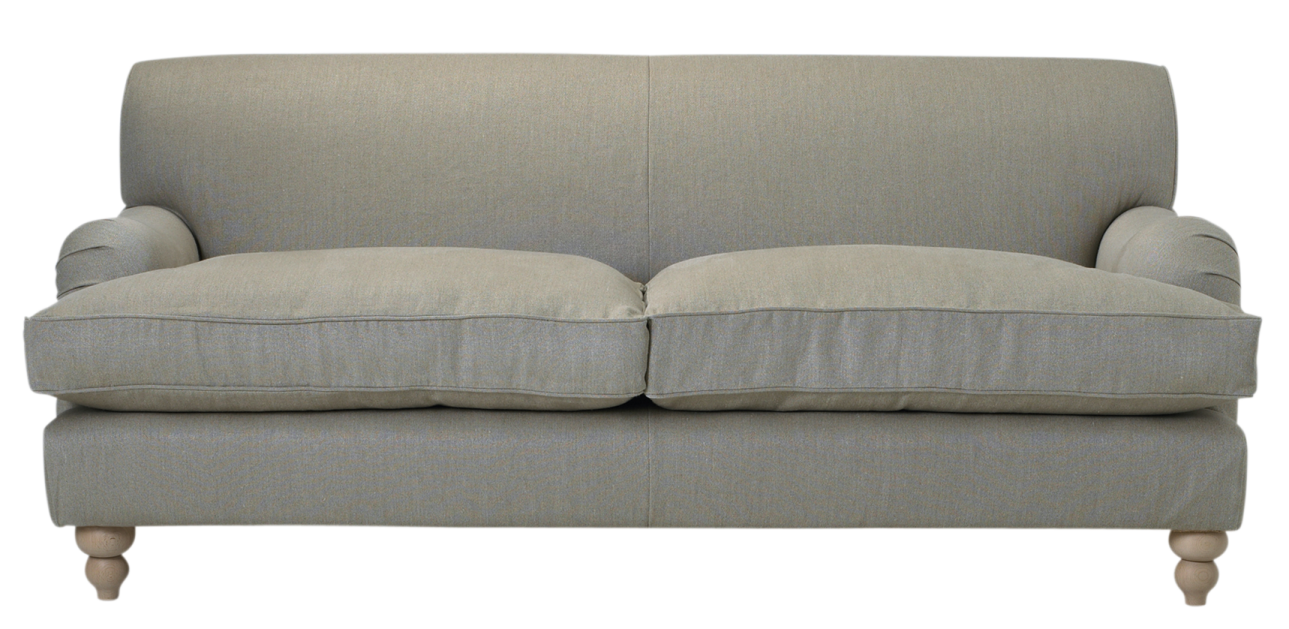 a grey couch with two pillows on it
