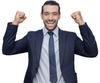 a man in a suit and tie with his fists raised