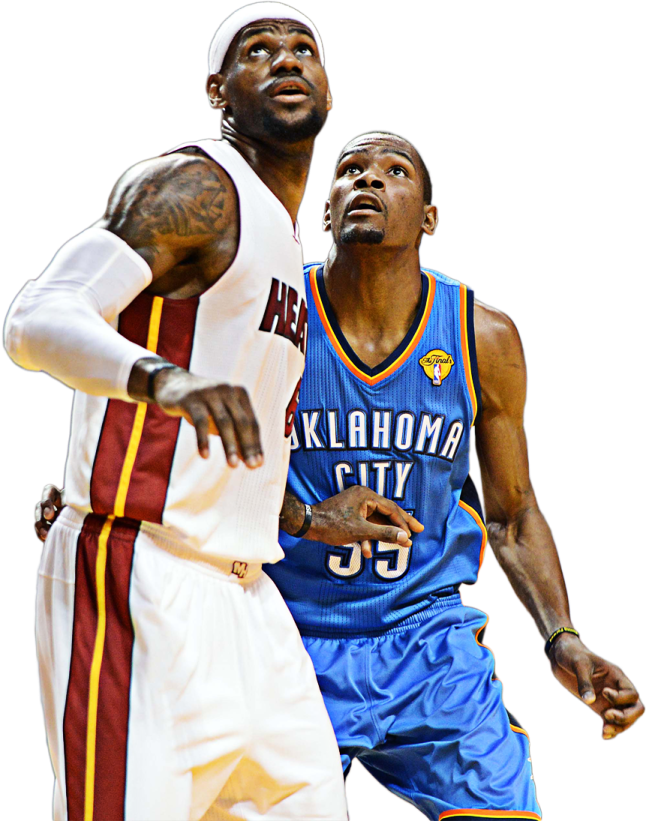two basketball players are fighting for the ball