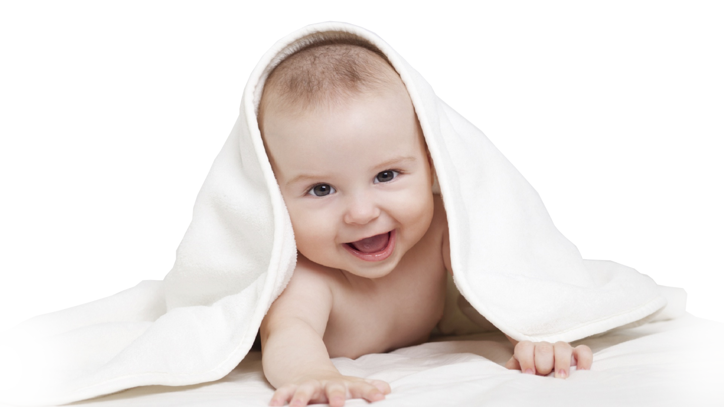 a smiling baby under a white blanket