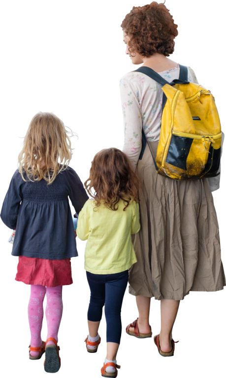 a woman and two young girls with backpacks