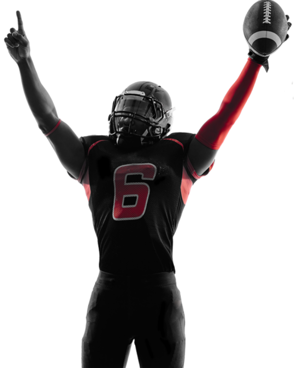 a silhouette of a football player with his arms up