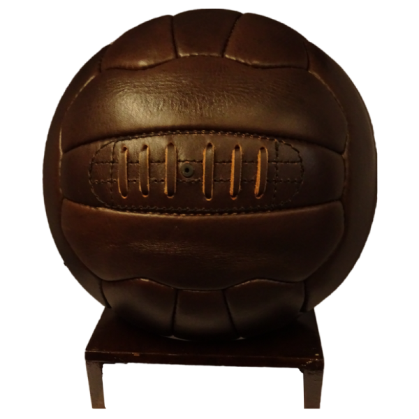 a brown leather soccer ball on a stand