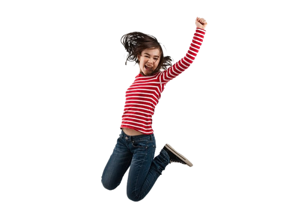 a young girl jumping in the air