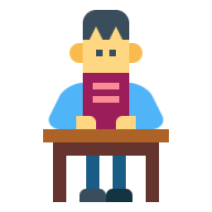 a person sitting at a desk with a book