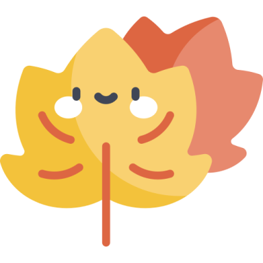 a yellow and red leaf with a smiley face