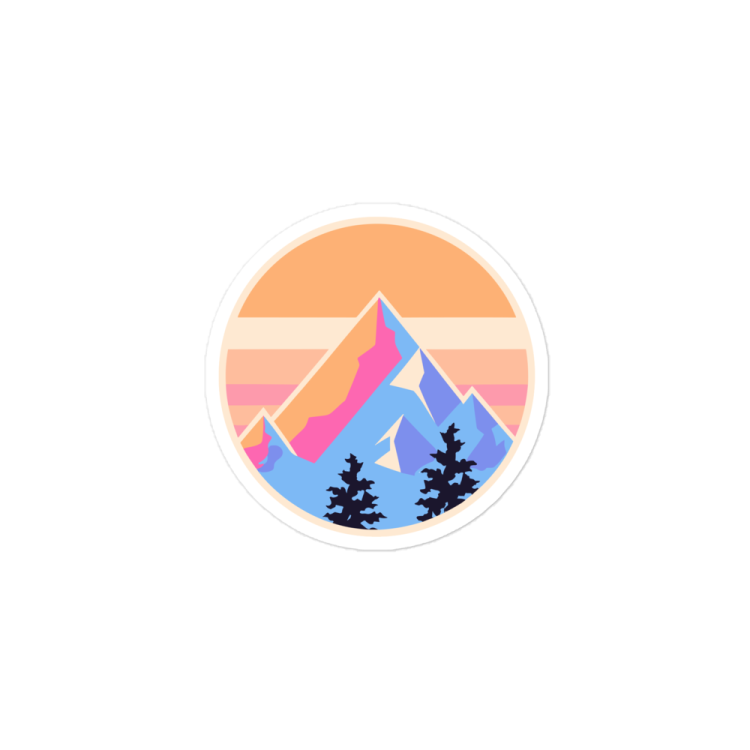 a sticker with mountains and trees in the background
