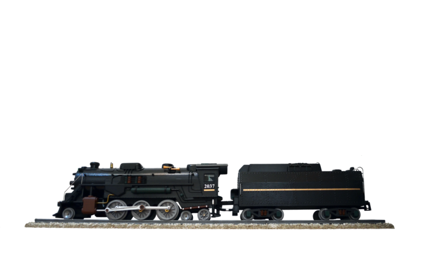 a toy train is shown on a white background