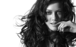 a black and white photo of a woman with long hair