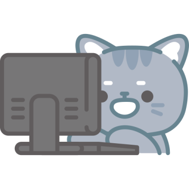 a cat sitting on top of a computer
