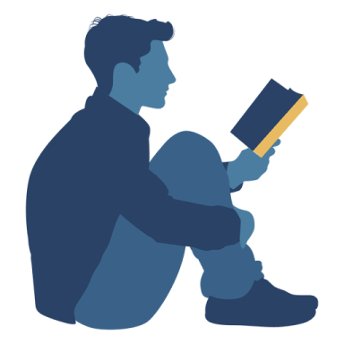 a man sitting on the ground reading a book