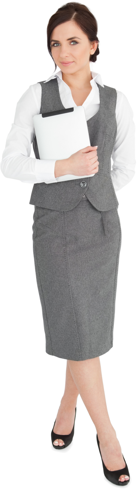 a woman in a business suit holding a laptop