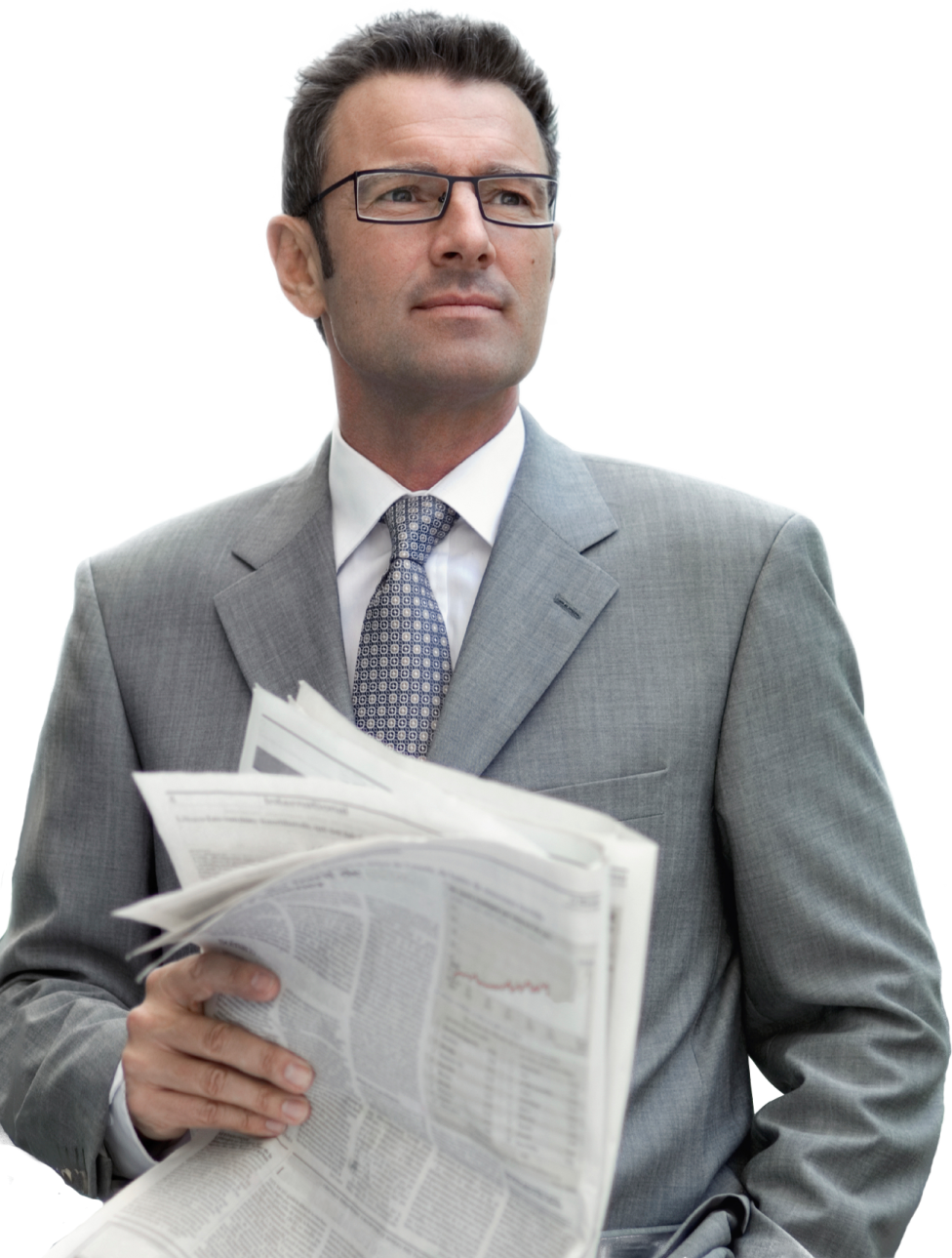 a man in a suit and tie reading a newspaper