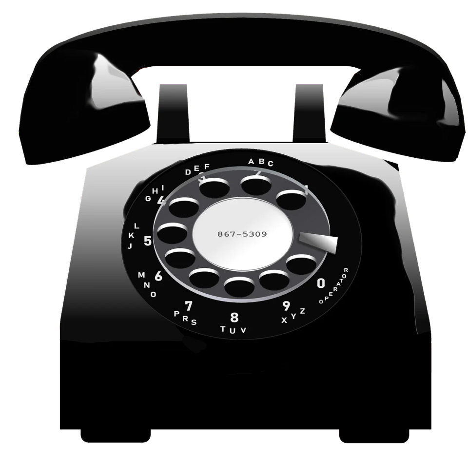 an old black telephone on a white background