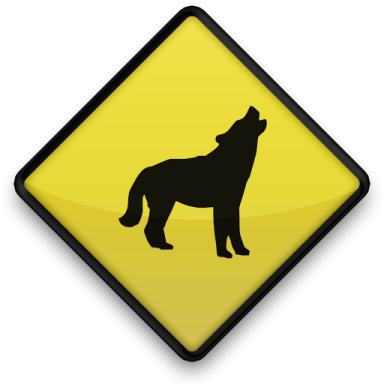 a yellow button with a black silhouette of a wolf