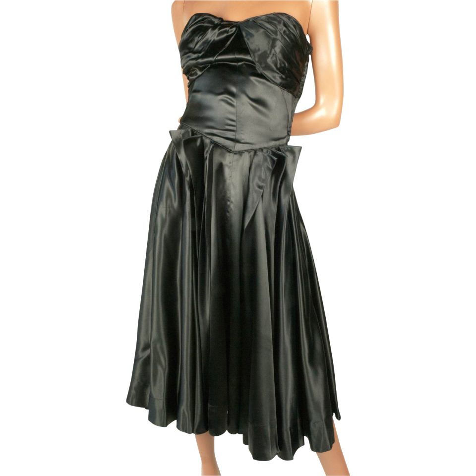 a woman wearing a black dress
