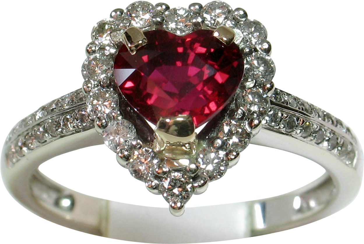 a heart shaped ruby and diamond ring