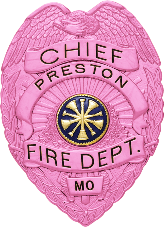a pink badge with the words chief fire department on it