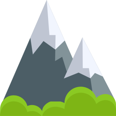 a mountain with trees in the fore
