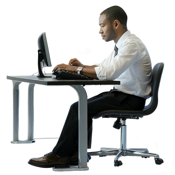 a man sitting at a desk using a laptop