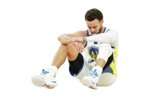 a man sitting on the ground with his legs crossed