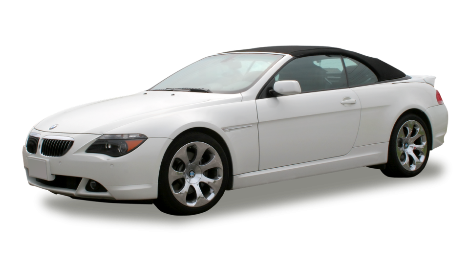 a white bmw convertible is shown in this image