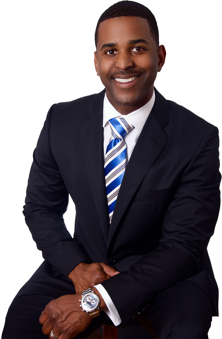 a man in a suit and tie posing for a picture