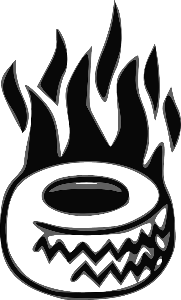 a black and white fire ring with flames