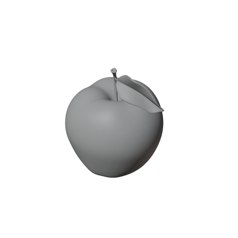a gray apple sitting on top of a white surface