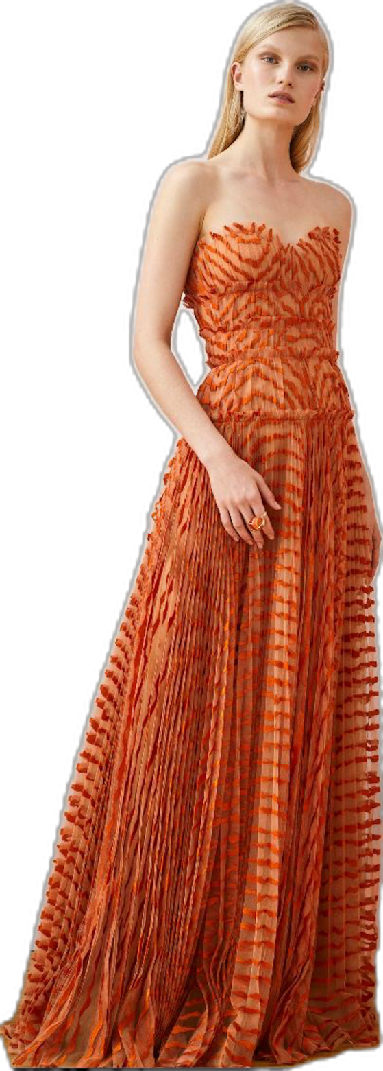 a woman in an orange dress