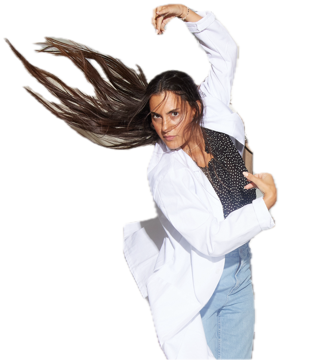 a woman with long hair in the air