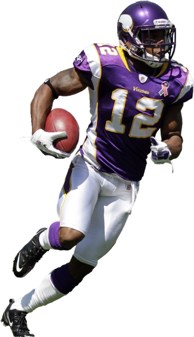 a football player is running with the ball
