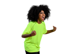 a little girl in a yellow shirt and black pants