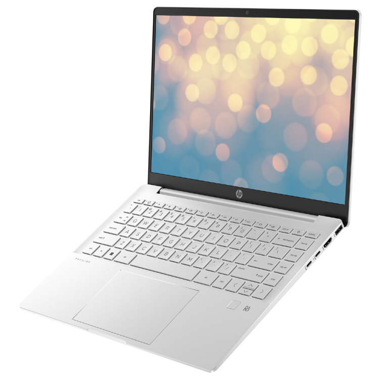 a laptop with a white keyboard on it