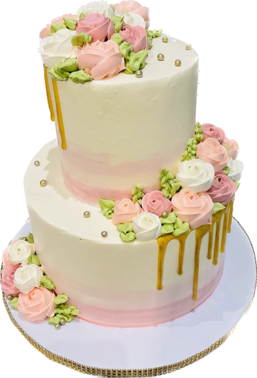 a white cake with pink and green flowers on top