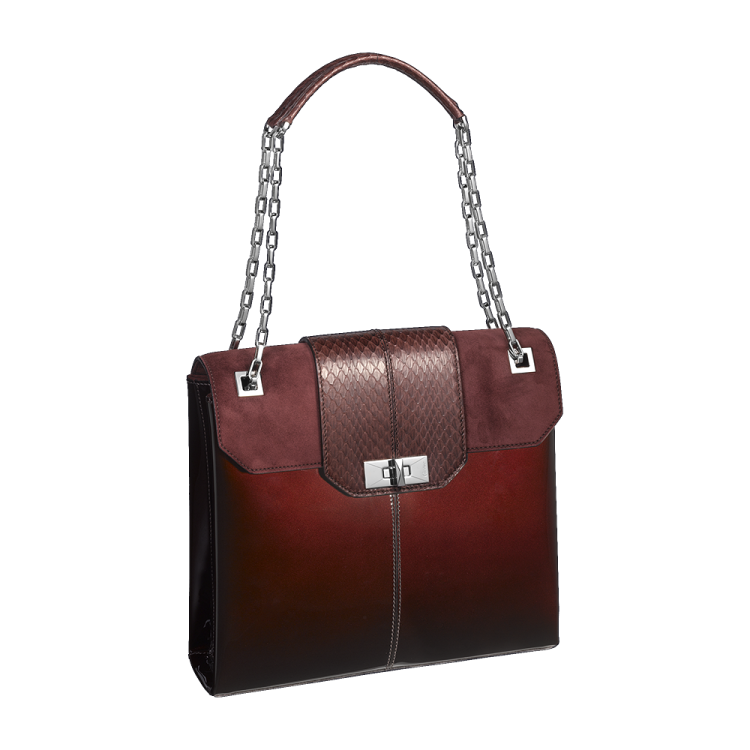 a brown and black handbag on a white background