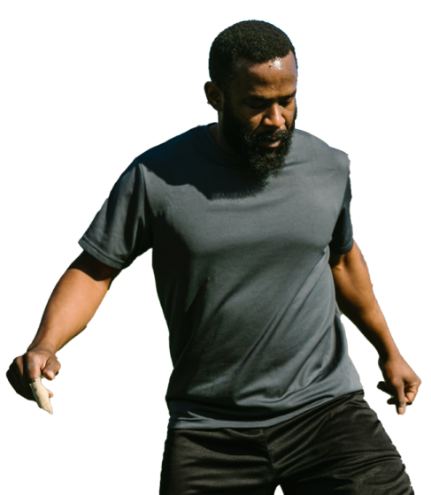 a man with a beard holding a baseball bat