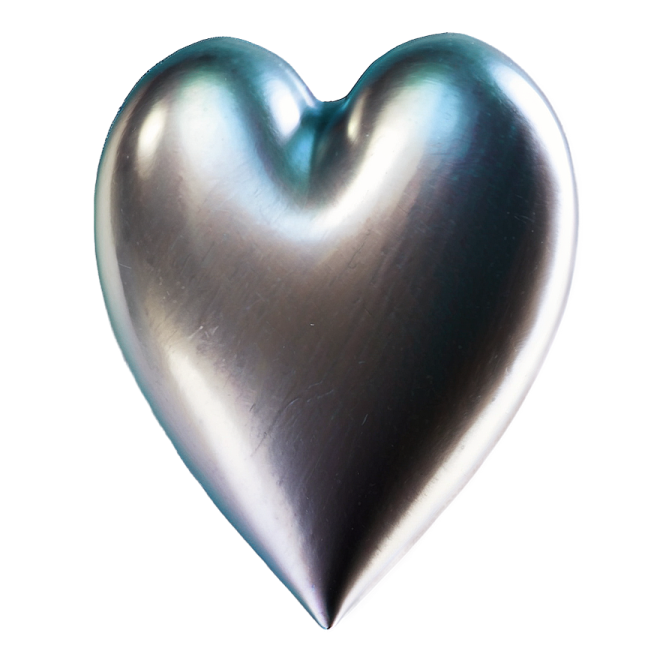 a metal heart on a white background